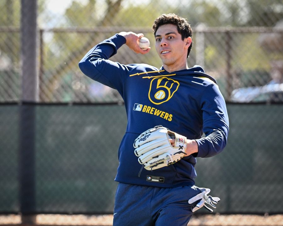 Deadspin | Brewers OF Christian Yelich (back) aims for Opening Day return