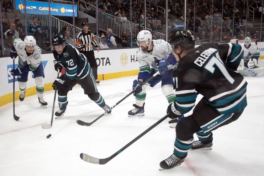 Deadspin | Canucks edge Sharks on Drew O'Connor's OT penalty shot