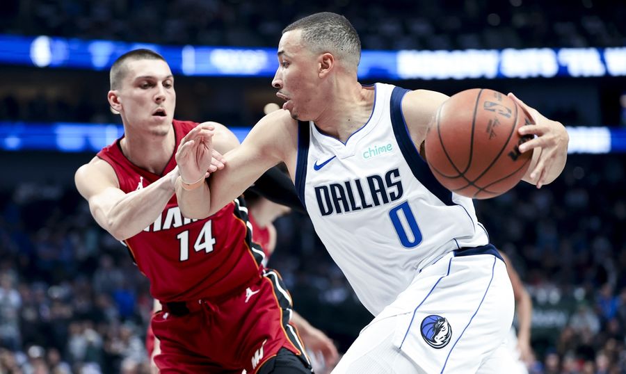 Deadspin | Short-handed Mavericks hold on to beat Heat