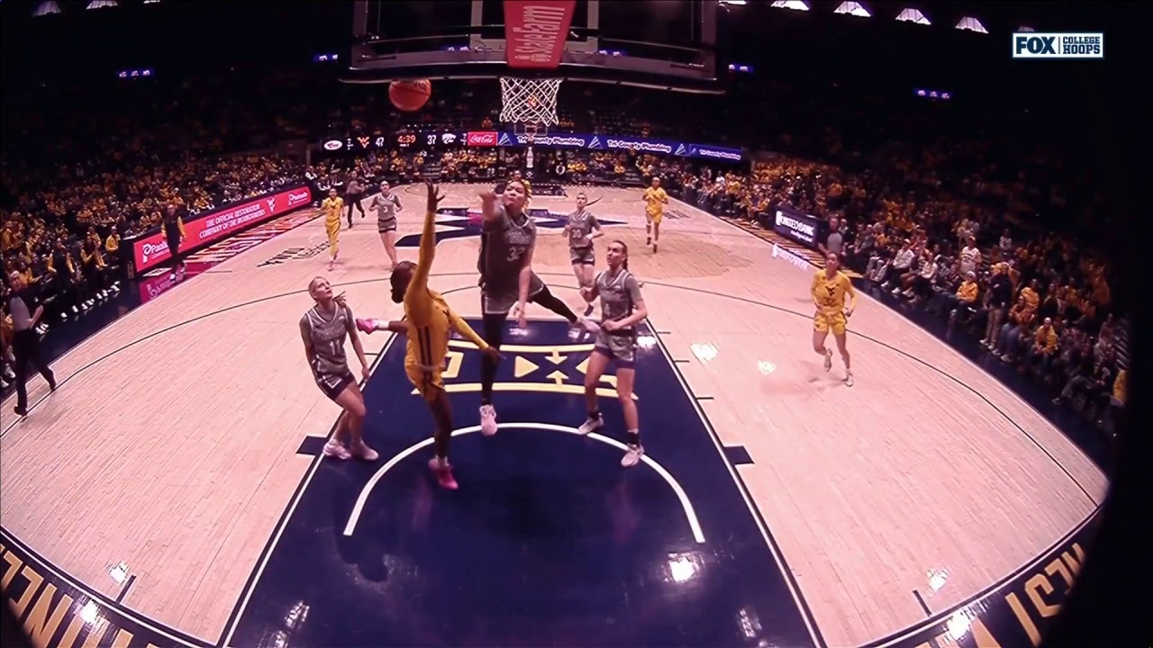 Jordan Harrison makes an and-1 layup, extending West Virginia’s lead over Kansas State