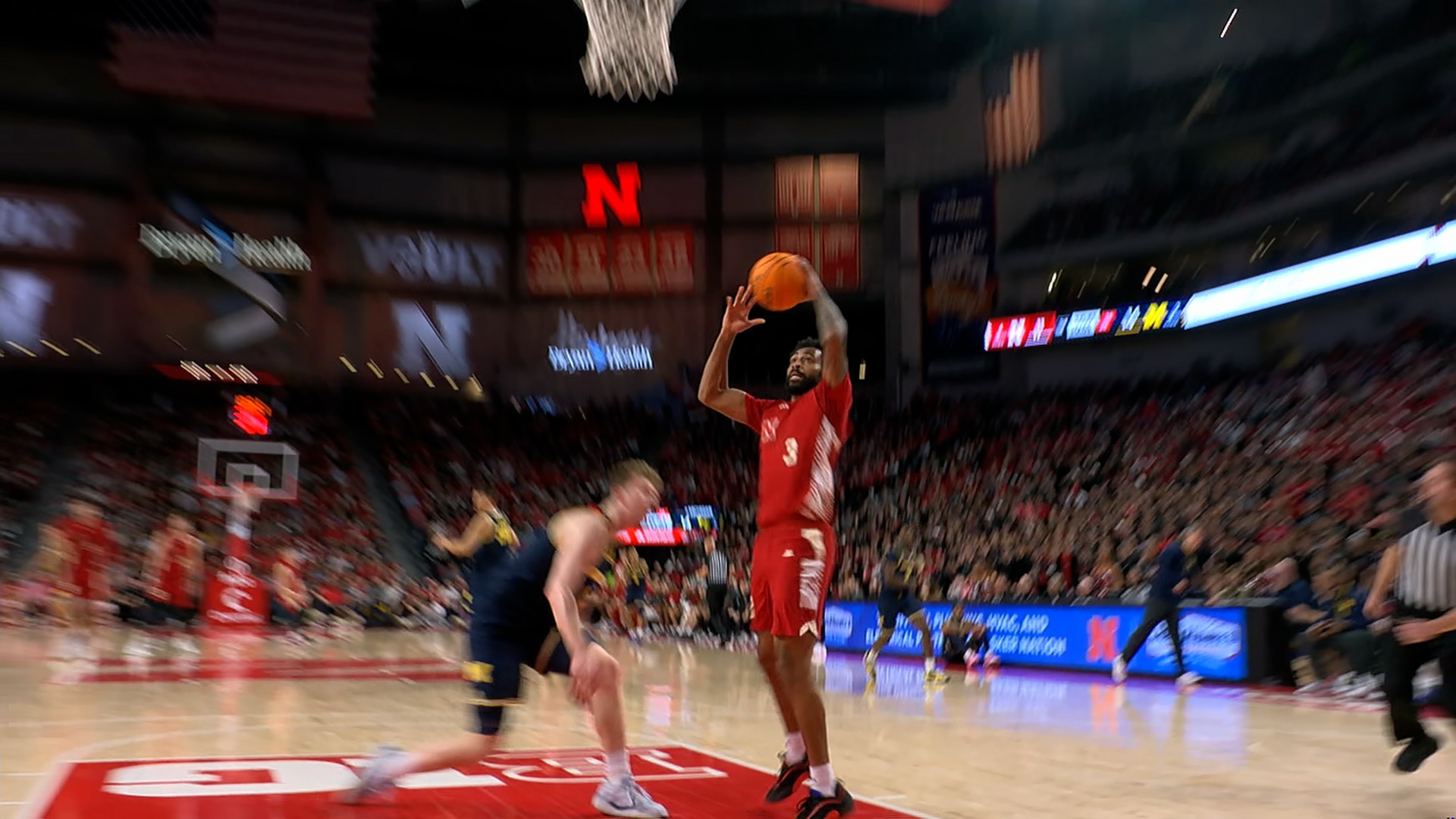 Nebraska's Brice Williams picks Michigan's pockets and throws down a wild jam