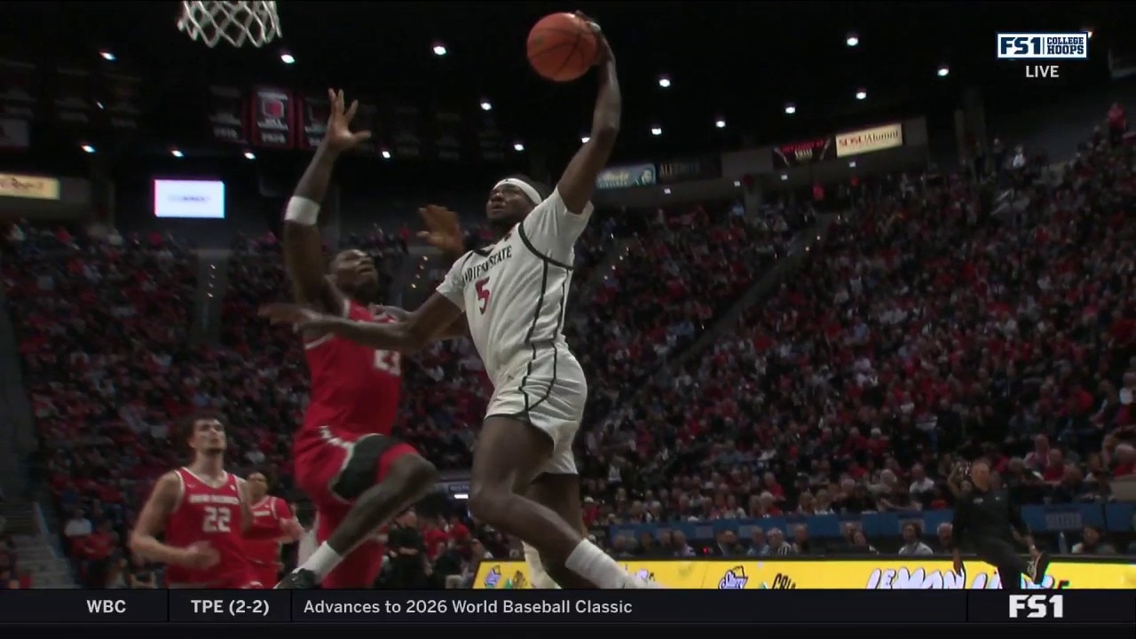 Pharaoh Compton throws down a monster dunk, extending San Diego State's lead over New Mexico