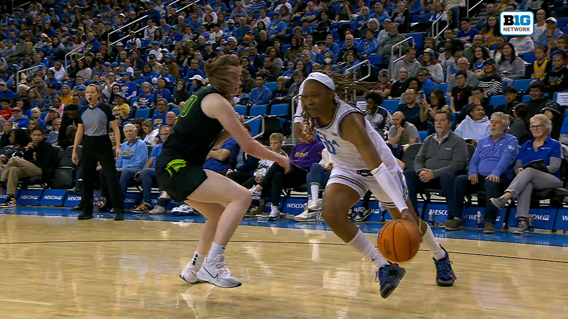 UCLA’s Janiah Barker aggressively drives to rim and finishes tough and-1 layup vs. Michigan State