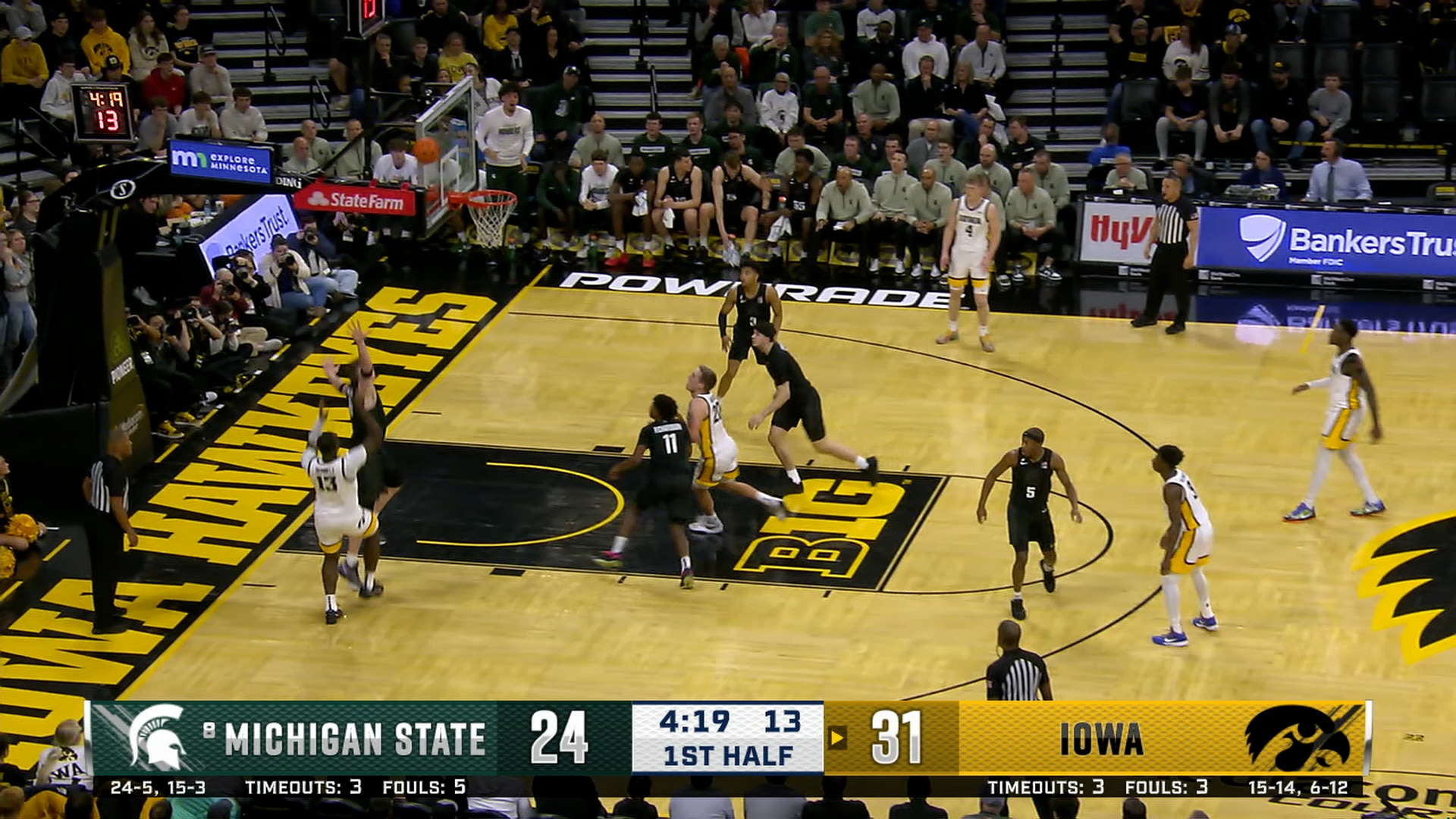 Iowa's Ladji Dembele hits a fadeaway jump shot against Michigan State