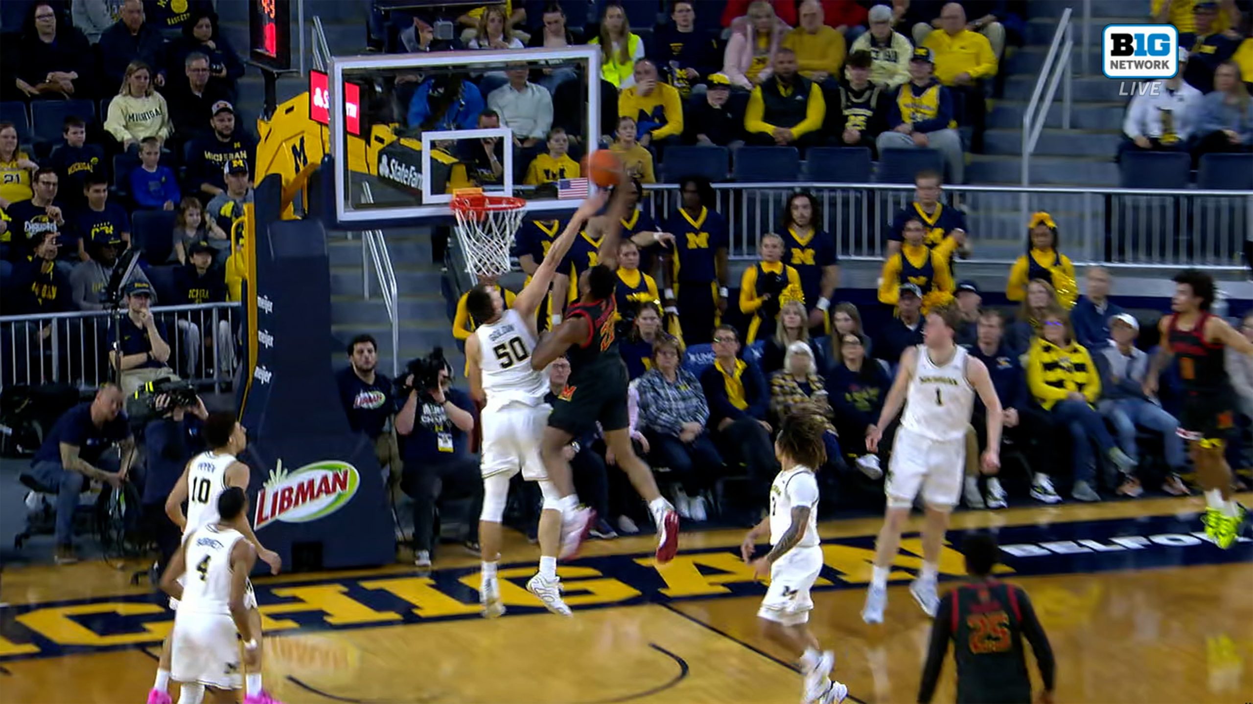 Maryland's Jordan Geronimo puts Michigan defender on a poster to extend lead